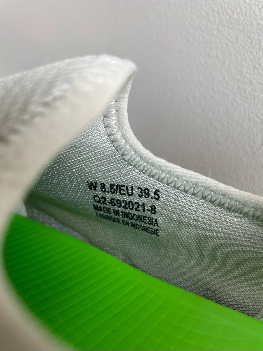 OOFOS Women's Slip-On Sneakers in Light Gray with Neon Green Insole